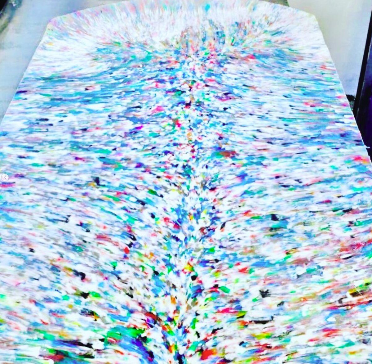Freshly pressed recycled-plastic sheet surface
